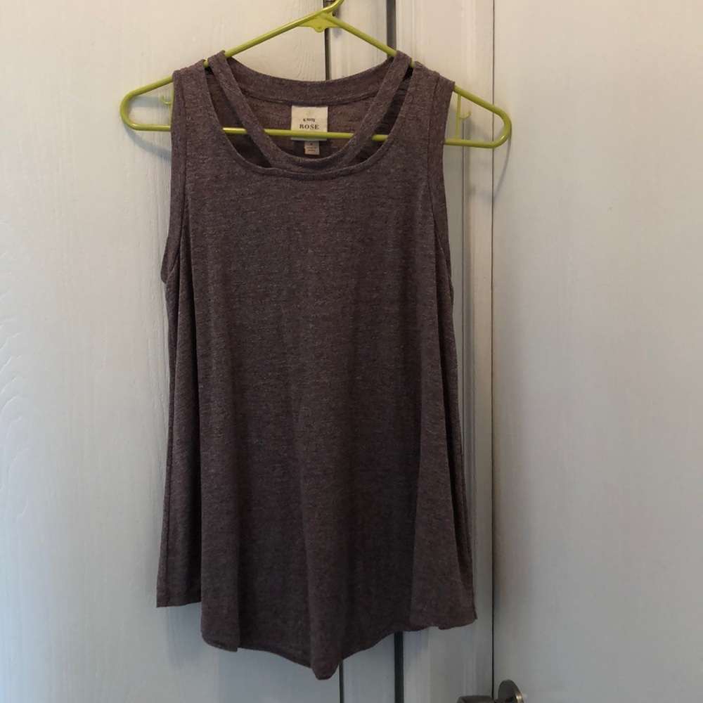 Pink tank with trendy neck cuts